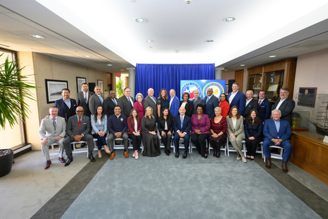 Members of the Harris County Commissioners Court and the Houston City Council, Houston Pilots, and Port Houston Commissioners and CEO pose in a historic group photo following a joint session between Harris County Commissioners Court and the Houston City Council. On Monday, the two governing bodies unanimously appointed Chairs to the Port Commission of the Port of Houston Authority and Pilot Board. Harris County Judge Lina Hidalgo (seated center in black jacket) and Houston Mayor John Whitmire (seated center with blue tie). Ms. Frances Casteneda Dyess, newly appointed Chair of the Pilot Board (standing behind Judge Hidalgo), and reappointed Port Commission Chairman Ric Campo (standing center in blue blazer). (Photo: Business Wire)