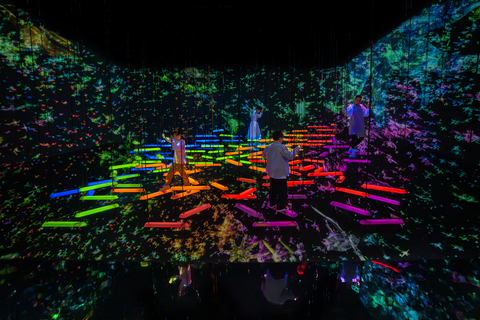 thumbnail teamLab, Aerial Climbing through a Flock of Colored Birds (c) teamLab - Aerial Climbing is a space where horizontal bars of varying colors are suspended by ropes and float three-dimensionally in the air. People use these bars to navigate the space in mid-air through three dimensions, trying not to fall.