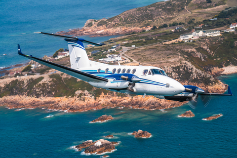 Beechcraft King Air 260 in flight (Photo: Business Wire)