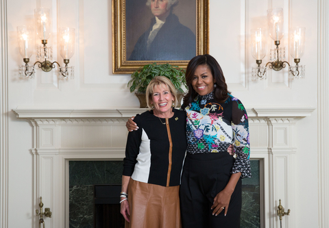 Former First Lady Michelle Obama (right) with Donna Martin (left), the Burke County nutrition director whose school meal program helped fuel a championship football team. Their story—including an unforgettable visit from Mrs. Obama to help plant their edible schoolyard—is detailed on The Charlie Cart Podcast. (Photo: Business Wire)