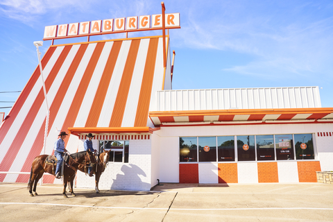 The 33-piece apparel and accessories collection ranges from a flavor-filled denim vest covered in iconic branded patches, to bold orange-and-white striped shorts and jeans. Trucker jackets featuring Whataburger's signature “Flying W” along with hamburger-inspired hoodies and tasty graphic tees and hats round out the collection with a “WhataWrangler” spin.(Photo: Business Wire)