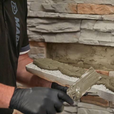 MAPEI offers the most complete systems of installation products for a large variety of manufactured stone veneer (MSV), natural stone veneer or thin-brick siding projects in order to simplify compliance with new building codes. (Photo: MAPEI)