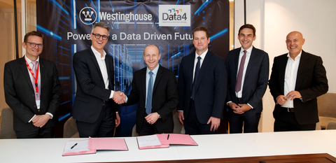 Westinghouse President and CEO Patrick Fragman (third from left) and Data4 CEO Olivier Micheli (second from left) are joined at the MoU signing by Westinghouse and Data4 leaders, including Deputy CEO Dan Sumner (third from right). (Photo: Business Wire)