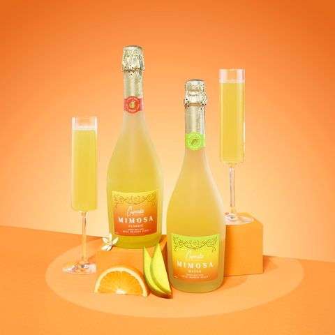 The new Cupcake Vineyards Mimosas are ready-to-serve, crafted with bubbly brut wine from Spain and real fruit juice. Available in two flavors, Classic Orange and Mango. (Photo: Business Wire)