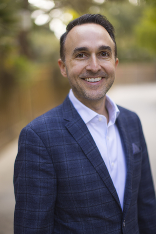 original Adam Sax is the Regional Operating Principal of KW Cayman Islands.