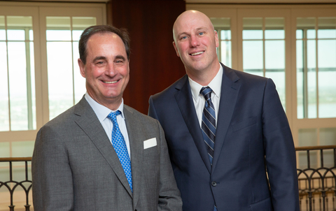 original (L-R) Marshall Redmon, managing partner of Phelps with William Mitchem, managing partner of Beggs & Lane.
