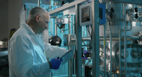original Pete Czerpack, Head of Bioprocess Engineering at Prolific Machines, monitors 200L bioproduction across stainless-steel bioreactor and proprietary illumination hardware.