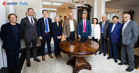 original Epsilon and Tufts team at the signing ceremony with logo.