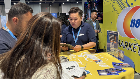 Ray Chung (center), senior category manager for Newegg Marketplace, meets with marketplace sellers during a convention earlier this year. Newegg Marketplace will exhibit at the Retail Innovation Conference and Expo 2024, June 5-6. (Photo: Newegg)