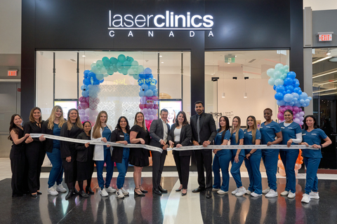 original Toby Milton, Managing Director of Laser Clinics Canada, with scissors, alongside the Canadian Support Office team and the clinic’s medical aesthetician team celebrate the official opening of the brand’s eighth Canadian location, at Vaughan Mills shopping centre in Vaughan, Ontario. PHOTO CREDIT: Garry Porter.