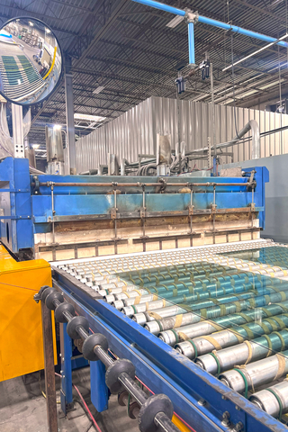 thumbnail Glass rolls into the oven for tempering.