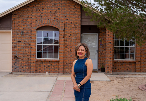 original Ms. Hernandez stands in front of her new home in El Paso, Texas. This milestone was made possible in part by a $25K Homebuyer Equity Leverage Partnership grant from FHLB Dallas that provided down payment assistance.