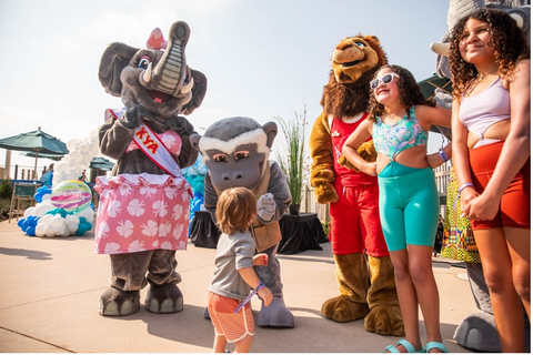 thumbnail Guests are greeted by Kalahari characters during the poolside celebration on National Waterpark Day.