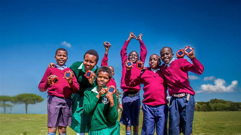 original Zayed Sustainability Prize beneficiaries celebrate receiving solar-powered lights (Photo: AETOSWire)