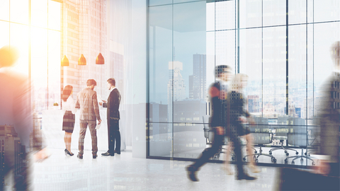 original Wells Fargo Commercial Banking Announces Collaboration with the National Center for the Middle Market (Image of workers in a modern office setting) (Photo: Wells Fargo)