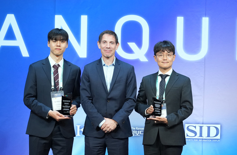 original UDC's Dr. Mike Weaver (center) presenting UDC's annual Innovative Research and Pioneering Technology Awards to Tae Wook Yang (left) and Dong Jun Kim (right).