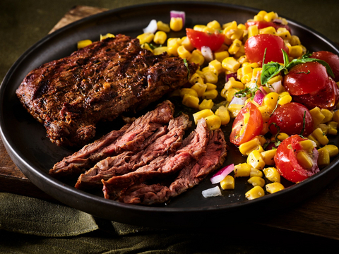 thumbnail Cowboy Marinated Skirt Steak with Corn Salad courtesy of BeefItsWhatsForDinner.com. Master the grill with this simple but flavorful Skirt Steak recipe. Served alongside an equally delicious corn salad.