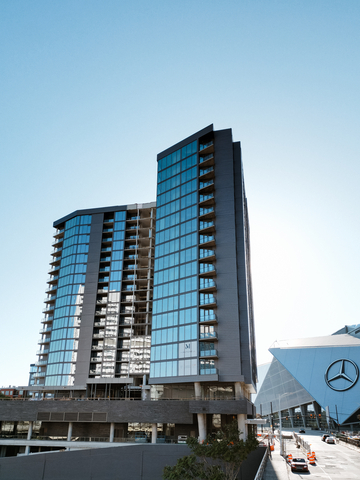 original CIM Group and Centennial Yards Company announce the grand opening of The Mitchell, the first residential tower and ground-up building completed within the $5 billion Centennial Yards mixed-use development in Downtown Atlanta.