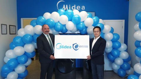 original Philip Xie, general manager, Midea Canada on the right with Chris Czupiel, president, ATIC on the left.