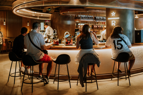 thumbnail Guests gather at the limestone-and-copper Reserve Bar, where coffee mixology adds a new layer of theater to the Bernabéu experience.
