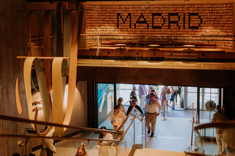 thumbnail Inside Starbucks flagship at Bernabéu, local artistry shines with Cristina Mejías’ suspended Siren sculpture and a mosaic mural spelling “Madrid.”
