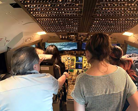 thumbnail Attendees entered a flight simulator to gain a sense of what it's like to operate a Boeing 757.