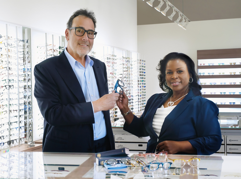original Peter Granoff, owner of ReadingGlasses.com and Tamesha Logan, executive director of American Mensa, "clink glasses" celebrating the limited edition eyewear partnership.