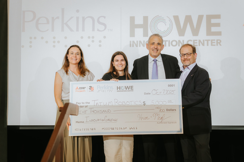 original Samantha Johnson, founder and CEO of Tatum Robotics, accepts first place prize.