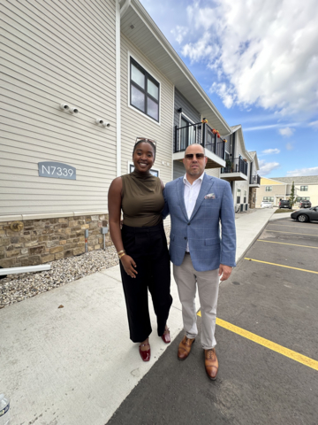 original Jess Grant-Domond, Senior Community Outreach and Engagement Specialist at FHLBank Chicago, and project developer Pete King, CEO of King Solutions and a member of 1822 Land & Development Company, at the grand opening of Red Willow Flats in Oneida Nation, Wisconsin, a development supported by $700,000 in Affordable Housing Program (AHP) funding from FHLBank Chicago through member Bay Bank.