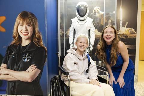 thumbnail Hayley with St. Jude patient Faith at the unveiling of Hayley's spacesuit at St. Jude Children's Research Hospital.