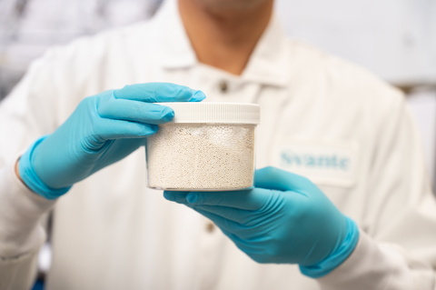 Svante scientist holding a jar of metal-organic framework (MOF), a relatively new class of nanomaterials for carbon capture mentioned in the Nobel Prize for Chemistry