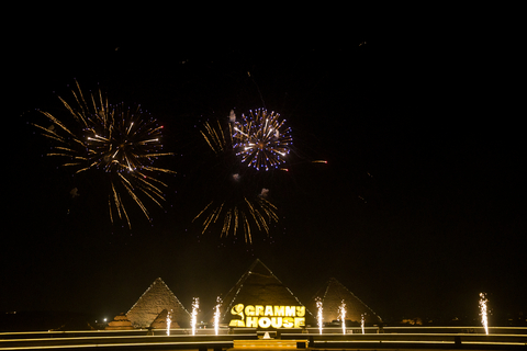 original GRAMMY House logo displayed with Great Pyramids of Giza in the background