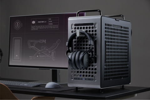 The QUBE 540 (Moondust Iron) with 3D-printed additions holding headphones and keyboard.