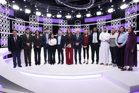 Guest speakers and participating students gather on the Doha Debates stage to discuss a fundamental question