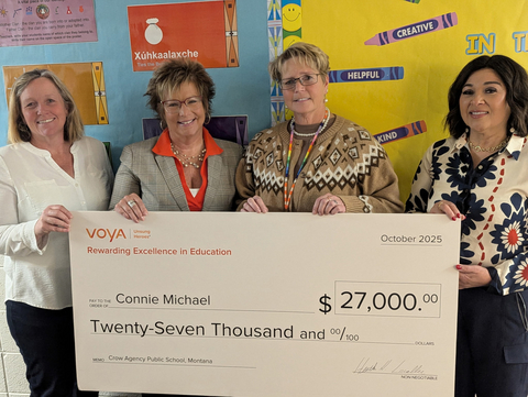 Left to Right: Assistant Superintendent Angie Keltner, Debbie Vichot (Voya), Connie Michael (winner), Sherry Foote (School Principal)