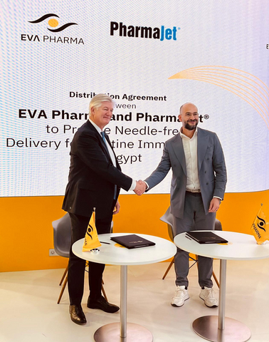 Riad Armanious, CEO of EVA Pharma and Wouter Latour, CEO of PharmaJet shake hands after signing the distribution agreement to provide PharmaJet Needle-free Injection Systems for routine polio immunization in Egypt.