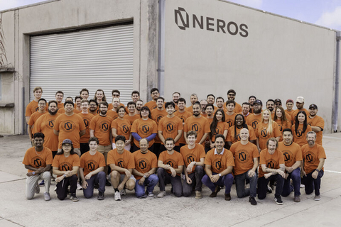 thumbnail Neros staff in front of the company office.