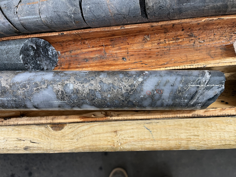 thumbnail Figure 3 – Image of the Core from drill hole 556 with circled VG (Visible Gold) between 287.1 and 289.7 m depth.