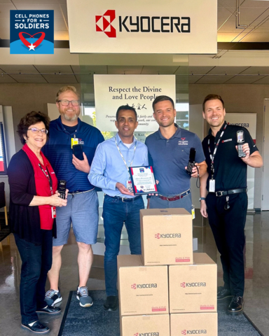 original Kyocera receives honors from Cell Phones for Soldiers (CPFS): from left are Laurie Rogers, Kyocera marketing; Ryan Hellerstedt, CPFS COO; Vipul Dalal, Kyocera DVP; Rob Bergquist, CPFS co-founder and director; and Elijah Fox, Kyocera marketing.