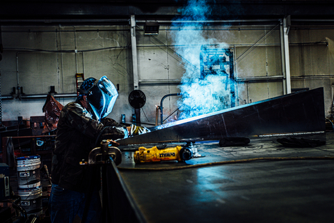 original HOJ Innovations team fabricating first heavy-lift, extreme length crane in company history.