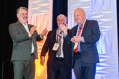 thumbnail On the left, Port Houston CEO Charlie Jenkins presents Co-Chief Executive Officer and Director of Enterprise Products Jim Teague with the Port Houston Lone Star Award. Joining Jim Teague on the stage is Bob Sanders, Executive Vice President, Asset Optimization, Enterprise Products.