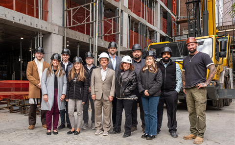 Finance and development team members visit the 33–35 W 125th Street site.