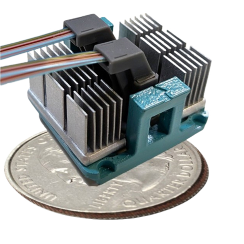 original PicoJool emerged from stealth and announced the development of a fundamentally new class of pixel-level photonics that make optical connectivity as inexpensive, compact, and manufacturable as copper. Shown here, the PicoJool Terapod is a VCSEL-based parallel optical link compatible with CPO, NPO, and front panel pluggable form factors. It can be configured for 16, 32, or 64 lanes from 1.6T to 6.4T of data bandwidth.