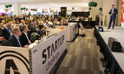 Eventual winner, Trey Daunis of Max-IR Labs, pitches their innovative technology during the 2025 SPIE Startup Challenge, engaging judges and a packed audience at SPIE Photonics West.