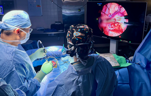 Brain surgery by Dr. Lee using the Viseon Hubble EXCITE 4K image displayed for primary visualization and observation by the surgical team.