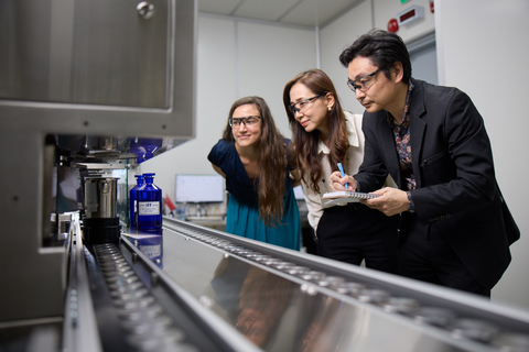 Photo credit:  IFF
Colleagues at IFF Chin Bee with the site's new smart-dosing robot.