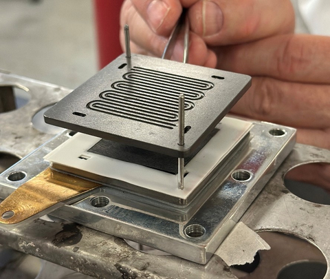 A bipolar plate, fabricated with a high-graphite content sourced from NMG’s Matawinie Mine, is inserted in a fuel cell station for performance testing.