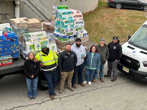 New Jersey American Water employees from its Salem Operating Center, package food and essential item donations for St. John's Pentecostal Church food bank in Salem. Pictured from left: Emily Zidanic, Sr. Supervisor of Operations, Harron Jefferies, Sewer Operator Mechanic, Cameron Cagle, Sewer Operator Mechanic, Ivan Porter, Sewer Operator Mechanic, Pam Rushing, Operations Specialist, Michael Gonserkevis Jr. Sr. Superintendent of Operations, and Curt Hunter, Sewer Operator Mechanic.