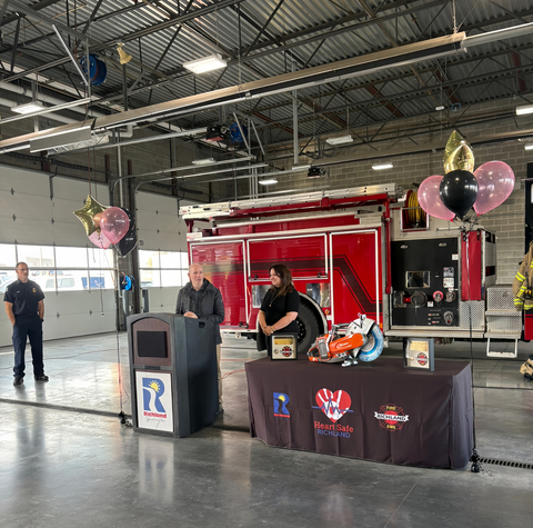 thumbnail Ken Bush, Franchisee of the Richland Dickey's, addresses the Richland Fire Department with Laura Rea Dickey, CEO of Dickey's Barbecue Restaurants, Inc.