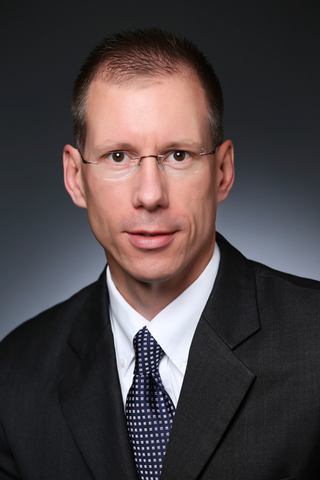 Aaron K. Edwards, CEO & President AIB International